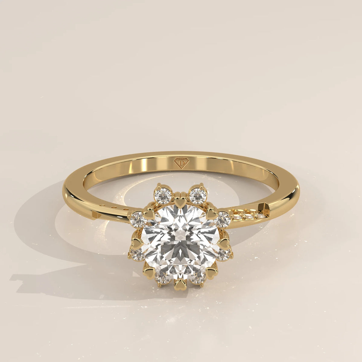 A round brilliant cut diamond engagement ring in 14k yellow gold.