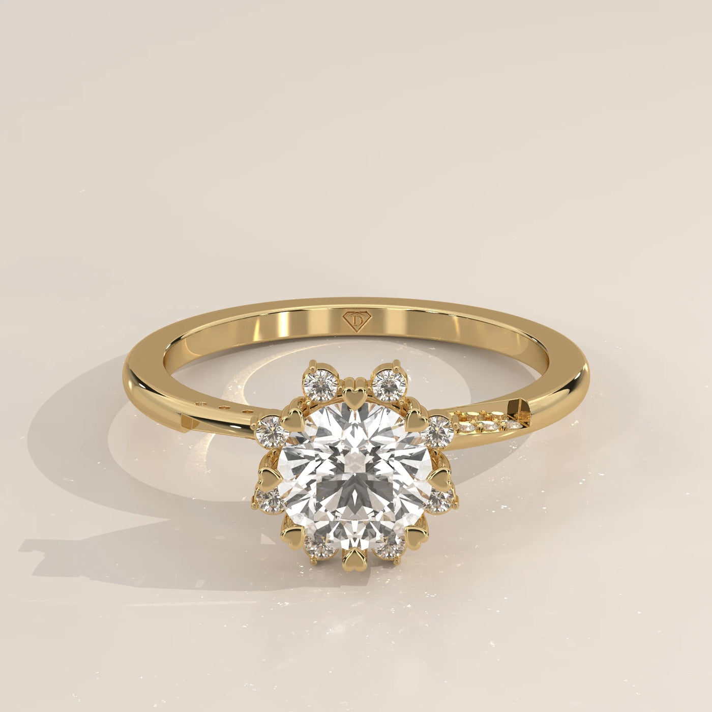 A round brilliant cut diamond engagement ring in 14k yellow gold.