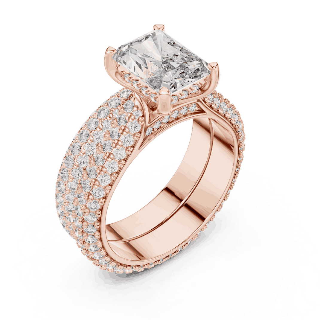 Angle View: Emerald Cut Diamond Solitaire Engagement Ring with Dome Triple-Row Micro-Pavé Band in 18K Rose Gold – Lab Grown – Driona Jewels