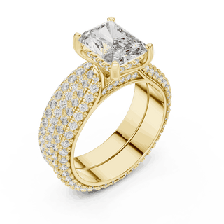 Angle View: Emerald Cut Diamond Solitaire Engagement Ring with Dome Triple-Row Micro-Pavé Band in 18K Yellow Gold – Lab Grown – Driona Jewels