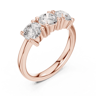 Three-Quarter View: Round Brilliant Diamond Three-Stone Engagement Ring with Marquise Side Stones in 18K Rose Gold – Lab Grown – Driona Jewels