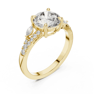 Angle View: Round Brilliant Diamond Three-Stone Engagement Ring with Marquise Side Stones in 18K Yellow Gold – Lab Grown – Driona Jewels