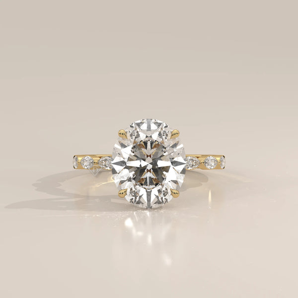 Eria 5 Carat Oval Lab Grown Diamond Ring, Bezel Marquise Band in yellow gold, photographed head-on.