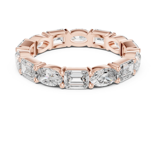 Flat Lay: Emerald Cut Diamond Eternity Band with Prong Setting in 14k Rose Gold – Lab Grown – Driona Jewels
