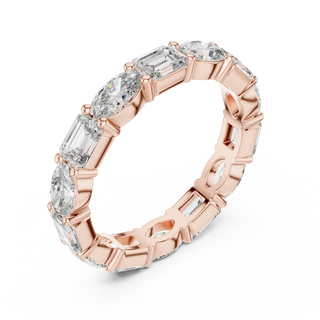 Three-Quarter View: Emerald Cut Diamond Eternity Band with Prong Setting in 14k Rose Gold – Lab Grown – Driona Jewels
