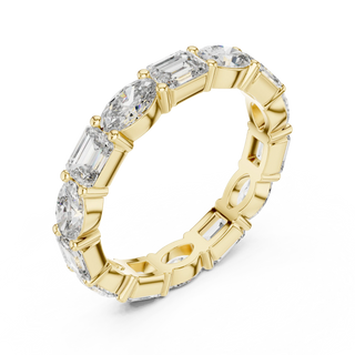 Three-quarter View: Emerald Cut Diamond Eternity Band with Prong Setting in 14k Yellow Gold – Lab Grown – Driona Jewels
