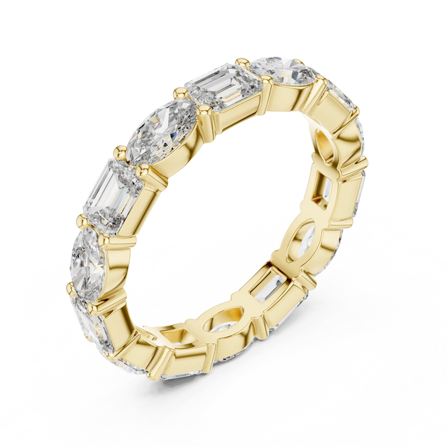 Three-quarter View: Emerald Cut Diamond Eternity Band with Prong Setting in 14k Yellow Gold – Lab Grown – Driona Jewels
