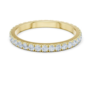 Angle View: Round Diamond Eternity Band with Shared-Prong Setting in 14K Yellow Gold – Lab Grown – Driona Jewels
