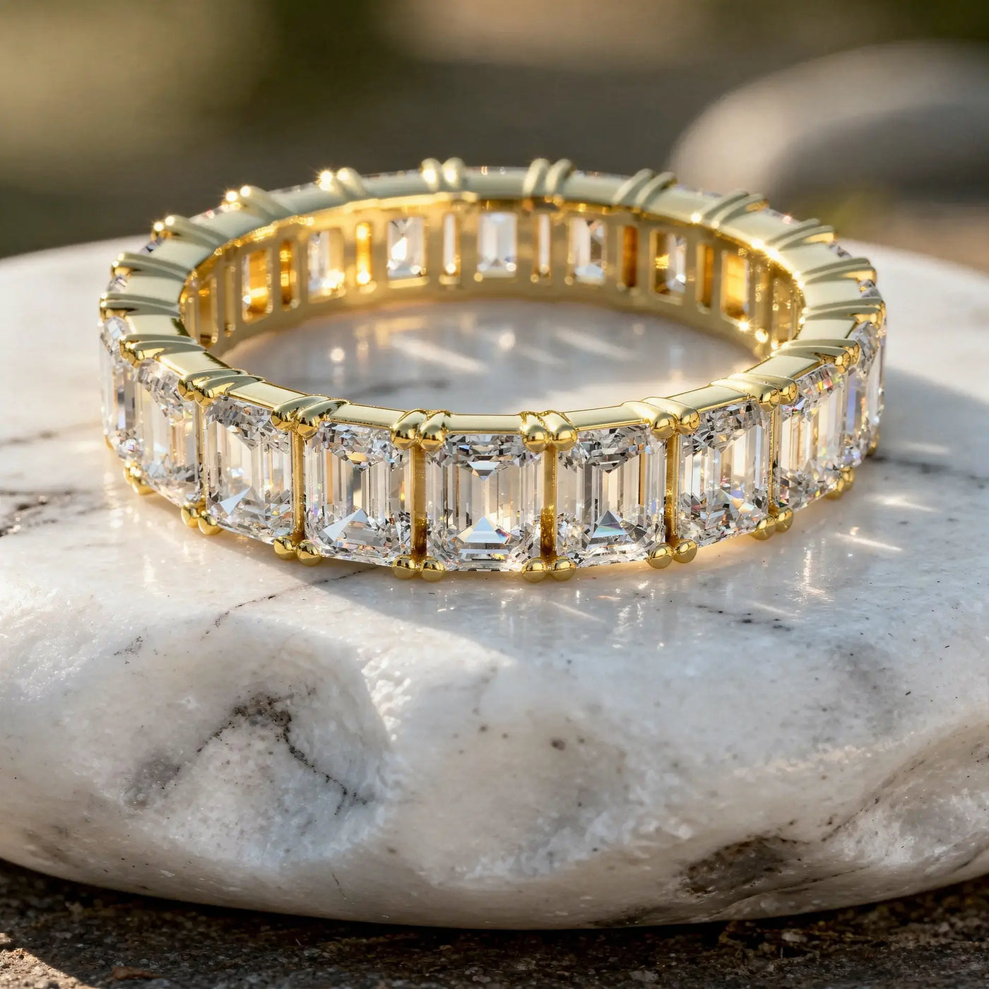 Close-up: Emerald Cut Diamond Eternity Band with Pave Setting in 14k Yellow Gold - Lab Grown - Driona Jewels