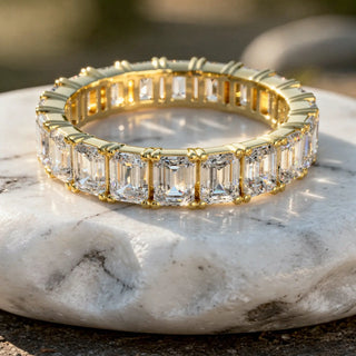 Close-up: Emerald Cut Diamond Eternity Band with Pave Setting in 14k Yellow Gold - Lab Grown - Driona Jewels