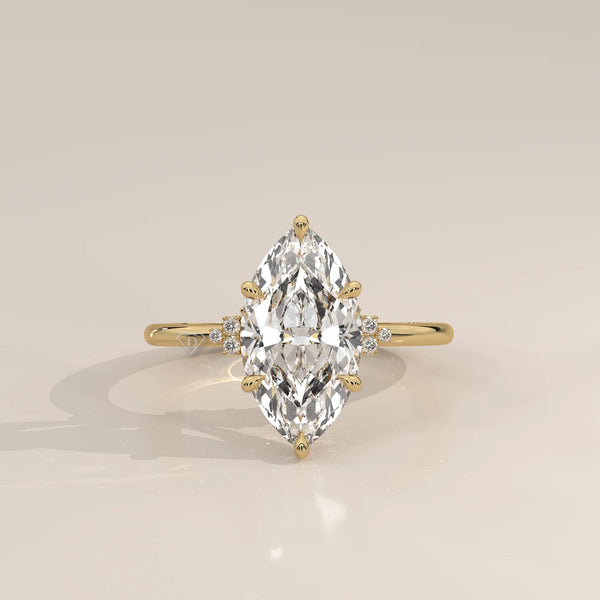 Fadie 5 Carat Marquise Lab Grown Diamond Ring, Cluster Shoulders in yellow gold, photographed head-on.