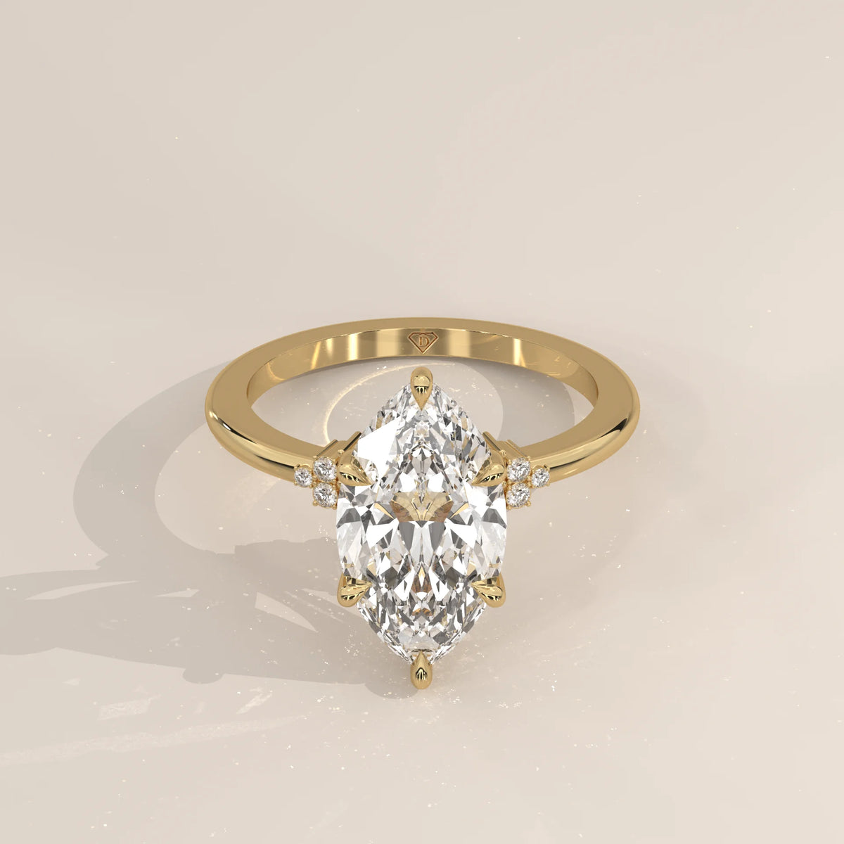 Fadie 5 Carat Marquise Lab Grown Diamond Ring, Cluster Shoulders in yellow gold, shown from the front.
