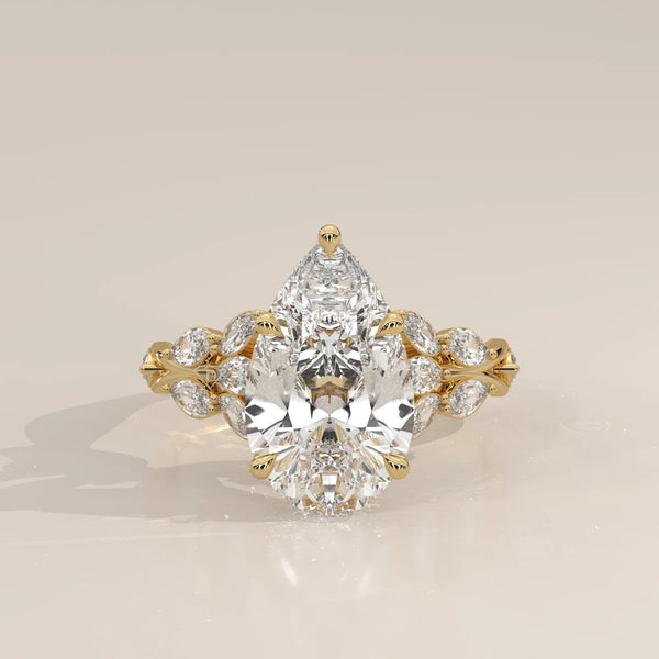 Fiana 5 Carat Pear Lab Grown Diamond Ring, Marquise Vine Band in yellow gold, photographed head-on.