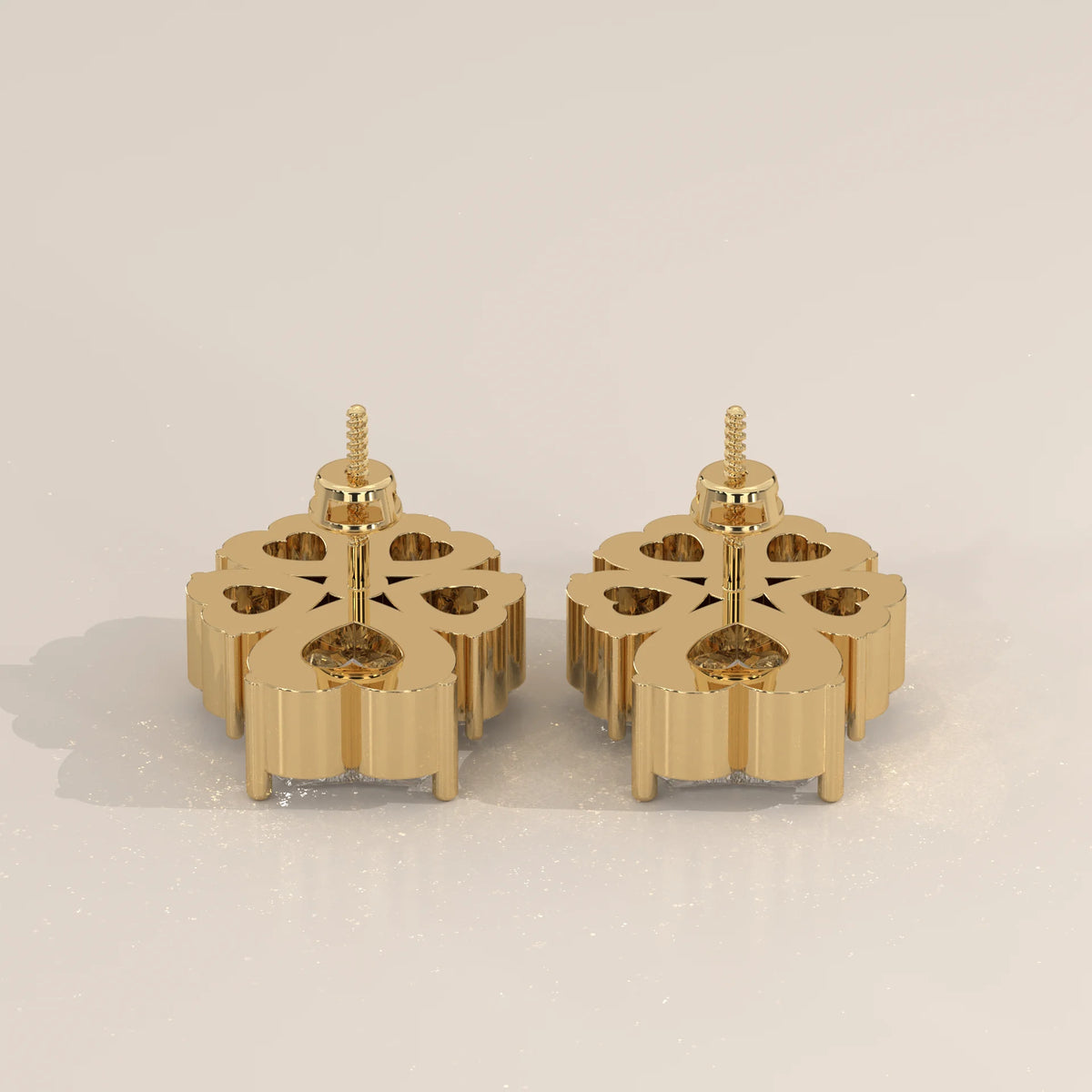 Five Heart Lab Grown Diamond Flower Stud Earrings with Gold Bead in yellow gold, photographed from the side.