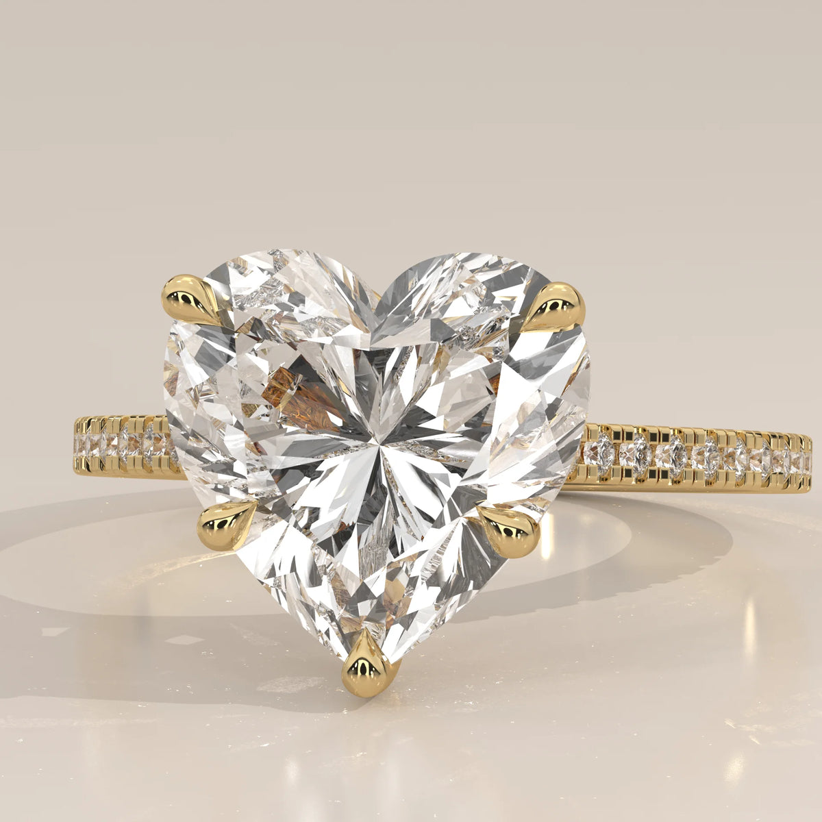 Floretta 5 Carat Heart Lab Grown Diamond Ring, Pave Band in yellow gold, front view on a plain background.