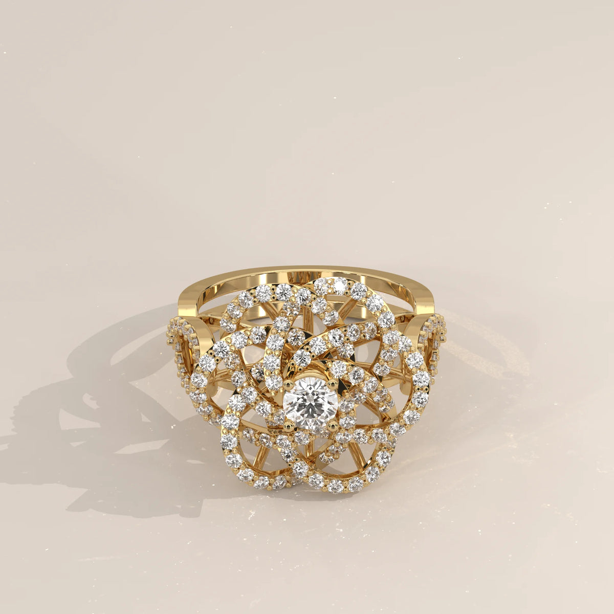 A detailed 14k gold ring with a floral design and small diamonds.