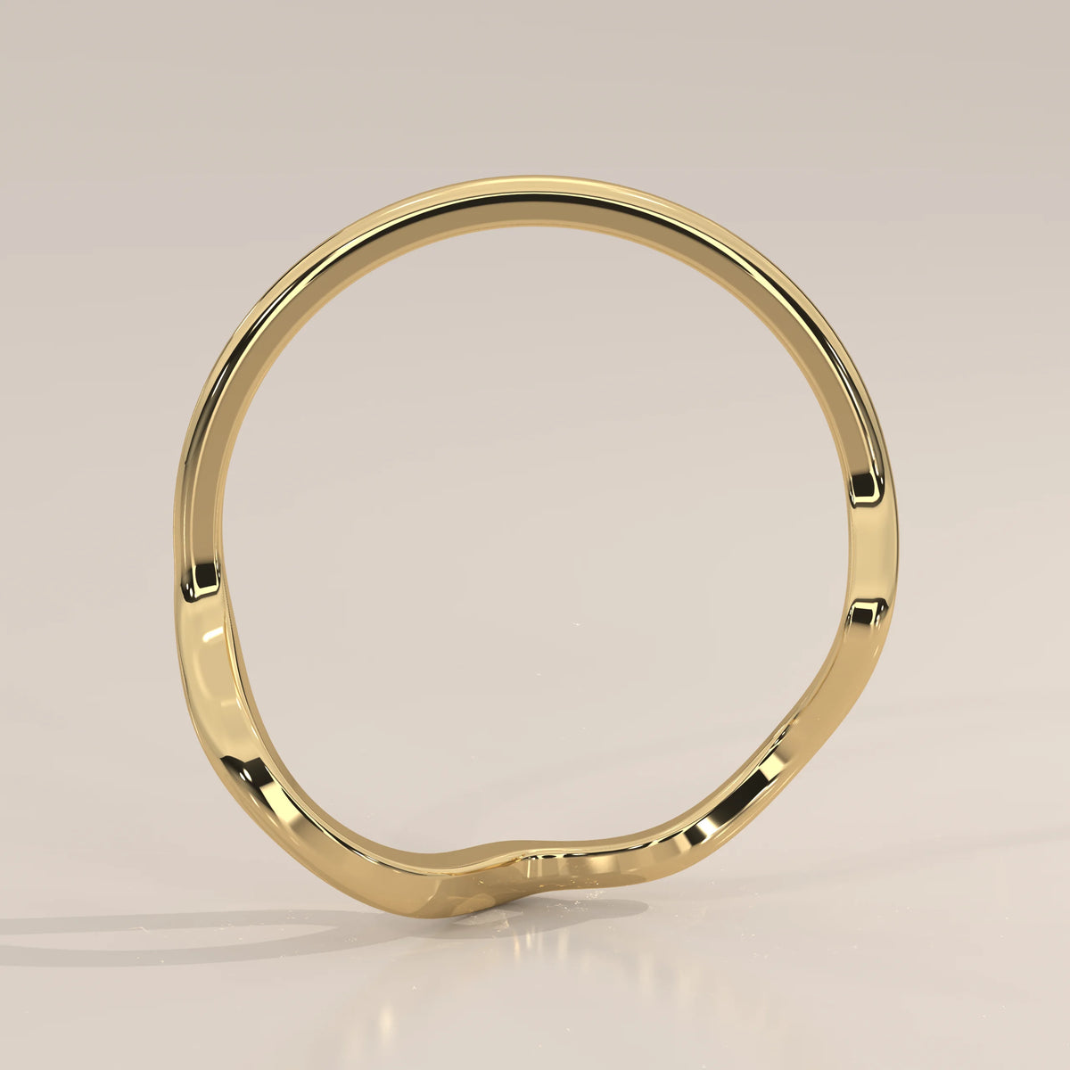 Freeform Wave Gold Ring with a Sculpted Open Curve, shown on a plain background.