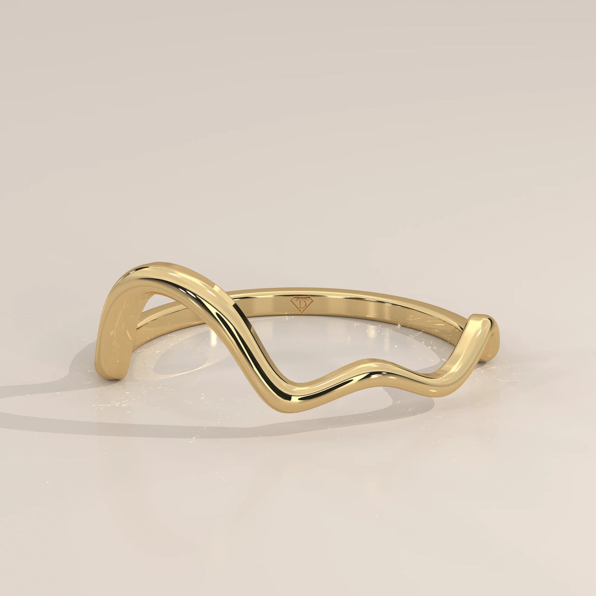 Freeform Wave Gold Ring with a Sculpted Open Curve, shown from the front.