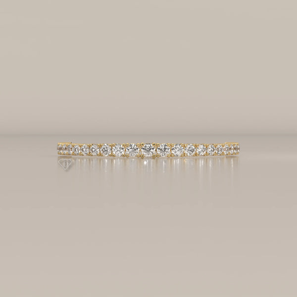 Graduated Round Lab Grown Diamond Half Tennis Chain Bracelet in yellow gold, shown on a plain background.