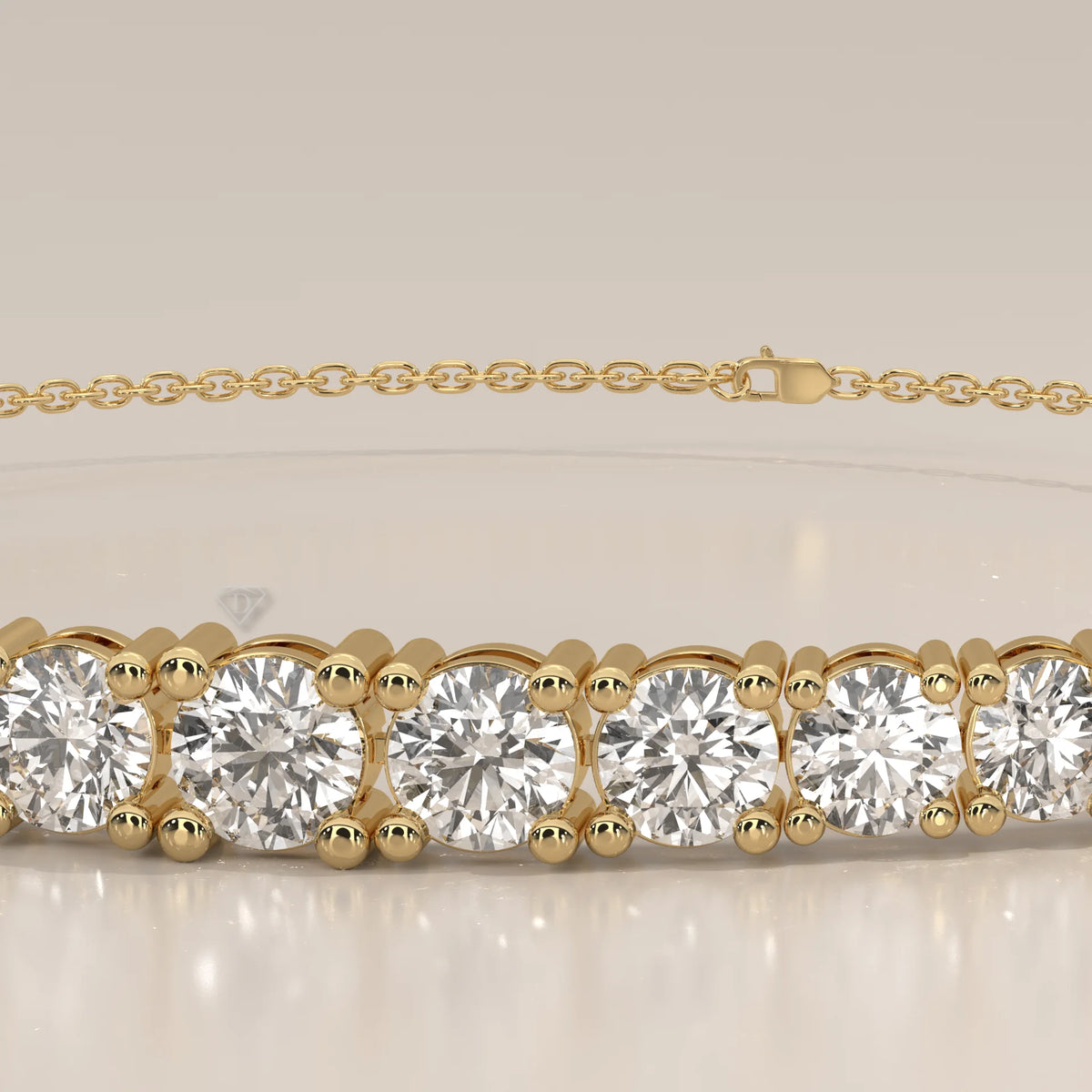 Graduated Round Lab Grown Diamond Half Tennis Chain Bracelet in yellow gold, studio photograph on a plain background.