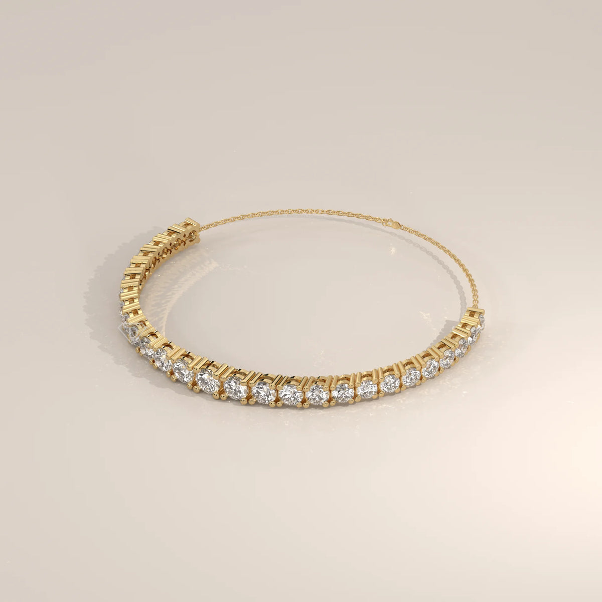 Graduated Round Lab Grown Diamond Half Tennis Chain Bracelet in yellow gold, product photograph on a plain background.