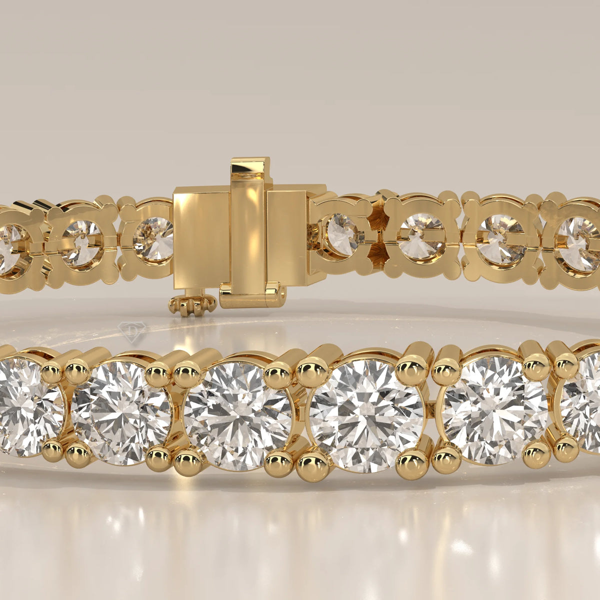 Graduated Round Lab Grown Diamond Tennis Bracelet, Four Prong in yellow gold, product photograph on a plain background.