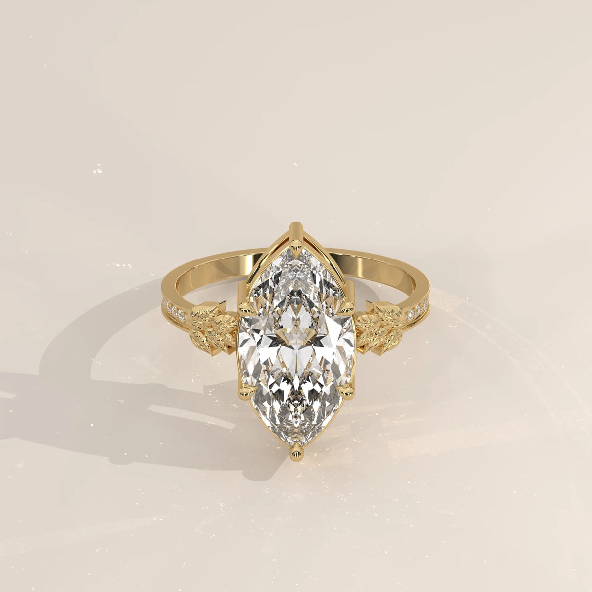 Gronie 5 Carat Marquise Lab Grown Diamond Ring, Carved Leaf Shoulders in yellow gold, shown at an angle from above.