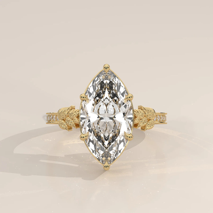 Gronie 5 Carat Marquise Lab Grown Diamond Ring, Carved Leaf Shoulders in yellow gold, shown from the front.