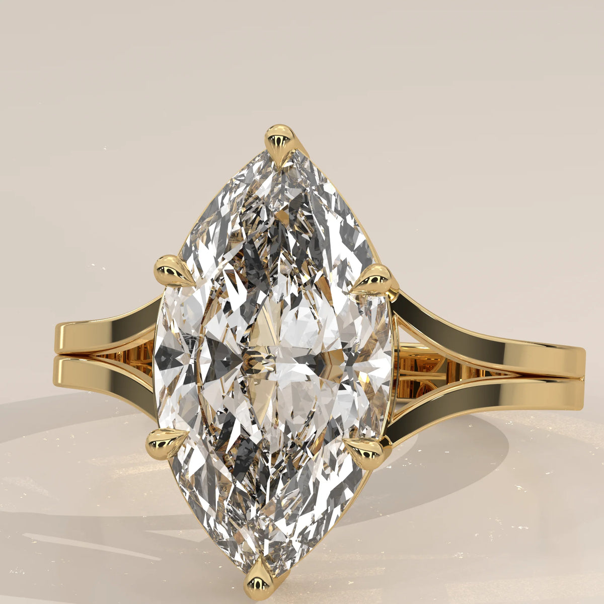 Hage 5 Carat Marquise Lab Grown Diamond Solitaire, Split Shank in yellow gold, front view on a plain background.