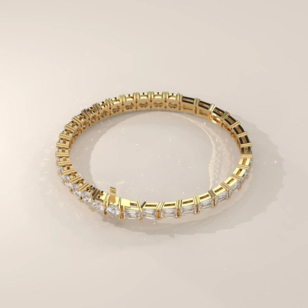 Half Round Half Emerald Cut Lab Grown Diamond Tennis Bracelet in yellow gold, photographed at a three-quarter angle.