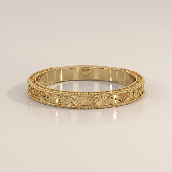 Hand Engraved Acanthus Scroll Gold Band with Milgrain Edges, shown from the side.