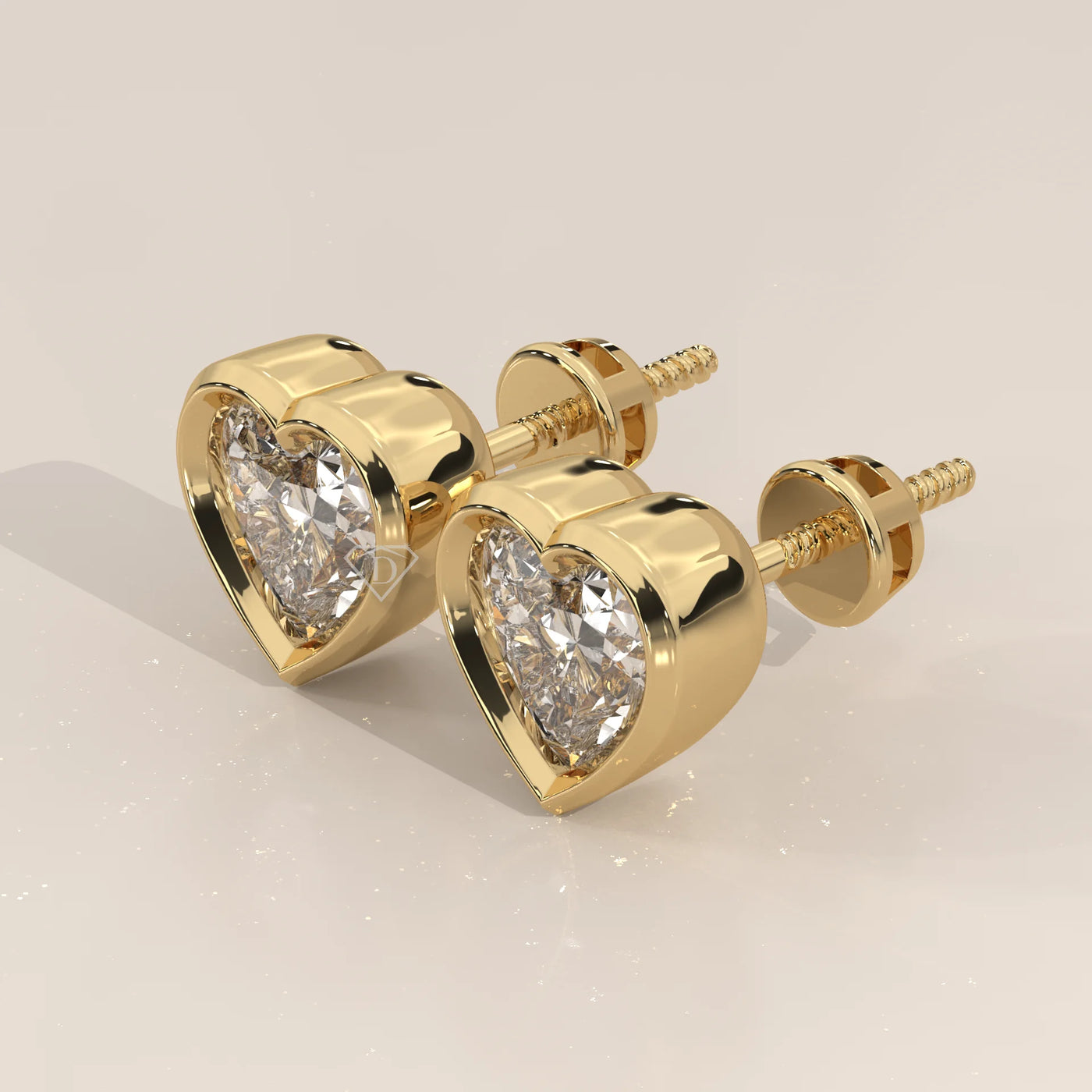 Three-Quarter View: Heart Diamond Stud Earrings with Bezel Setting in Yellow Gold – Lab Grown – Driona Jewels