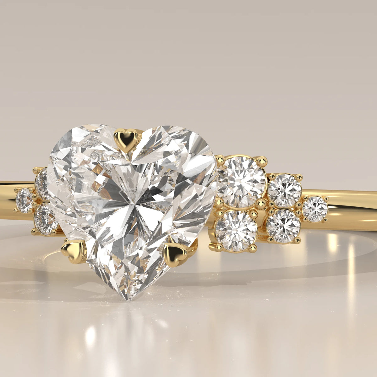 Gold ring with a heart-shaped diamond and smaller accent diamonds.