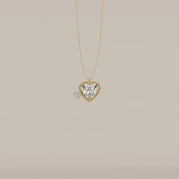 A delicate gold chain necklace featuring a heart-shaped diamond.