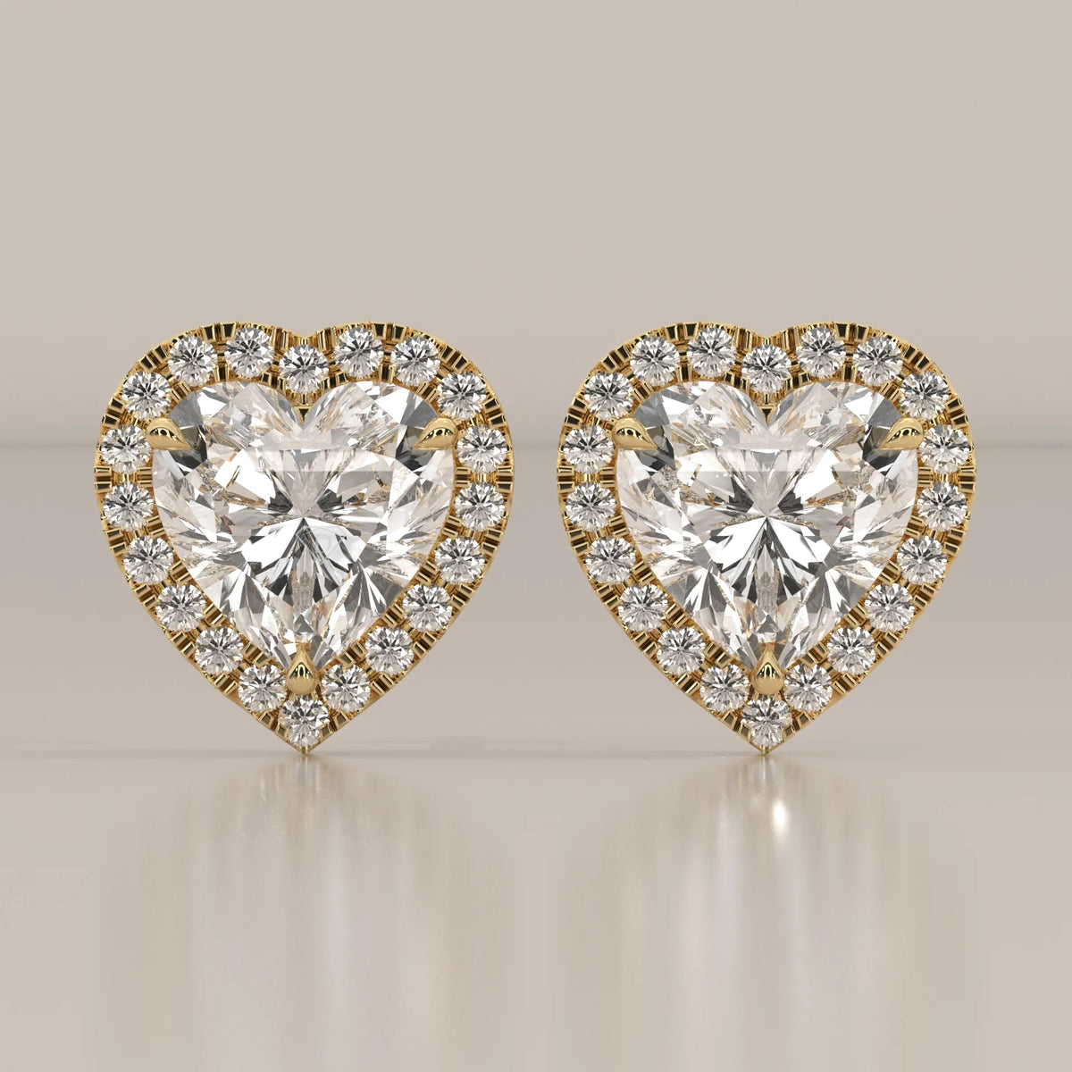 Heart Shape Halo Lab Grown Diamond Stud Earrings with Screw Backs in yellow gold, shown from the front.