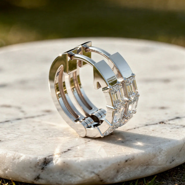 Three-quarter-view: Emerald Cut Diamond Hoop Earrings with Bezel Setting in 14k White Gold - Lab Grown - Driona Jewels