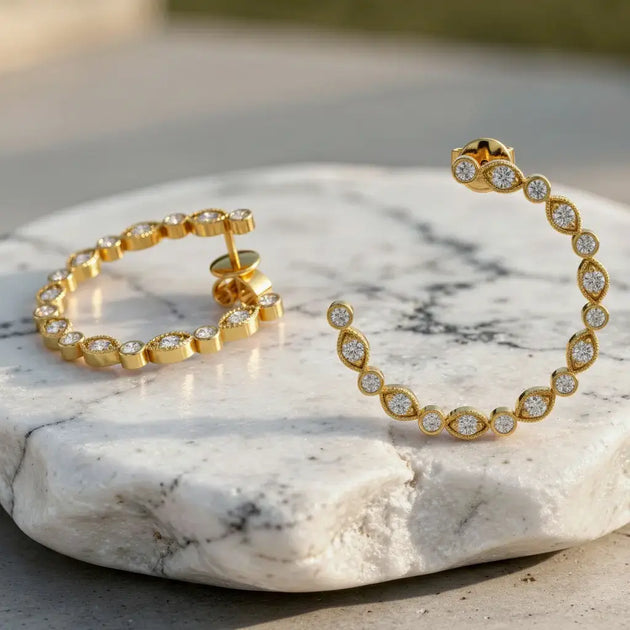 Flat Lay: Round Diamond Hoop Earrings with Pave Setting in 14k Yellow Gold - Lab Grown - Driona Jewels