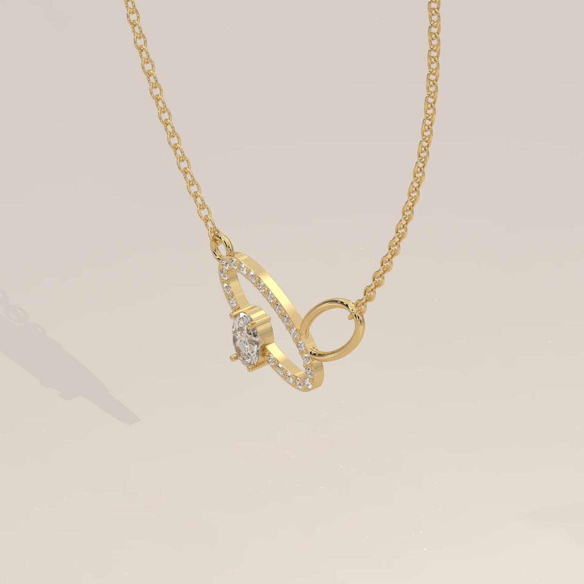Interlocking Oval Loops Pendant with Pave and Oval Lab Grown Diamond in yellow gold, photographed head-on.