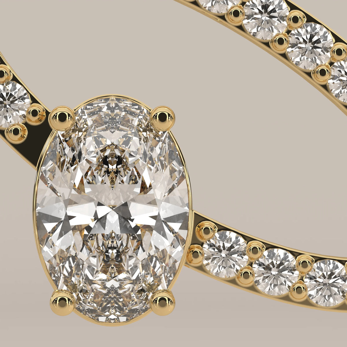 Interlocking Oval Loops Pendant with Pave and Oval Lab Grown Diamond in yellow gold, studio photograph on a plain background.