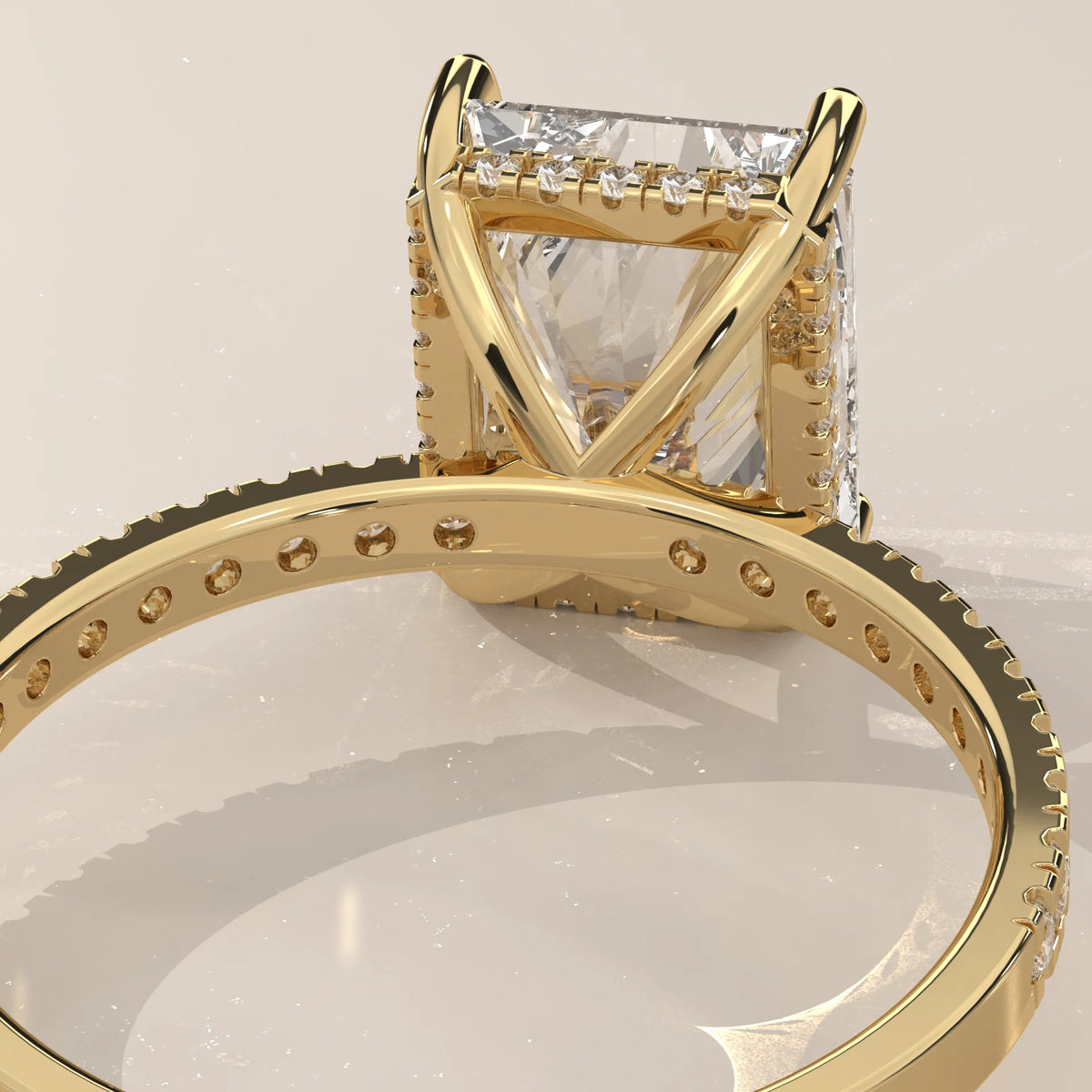 Ivory 5 Carat Radiant Lab Grown Diamond Ring, Hidden Halo Pave Band in yellow gold, shown on a plain background.