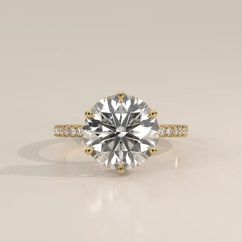 Jlina 5 Carat Round Lab Grown Diamond Ring, Six Claw Hidden Halo in yellow gold, photographed head-on.