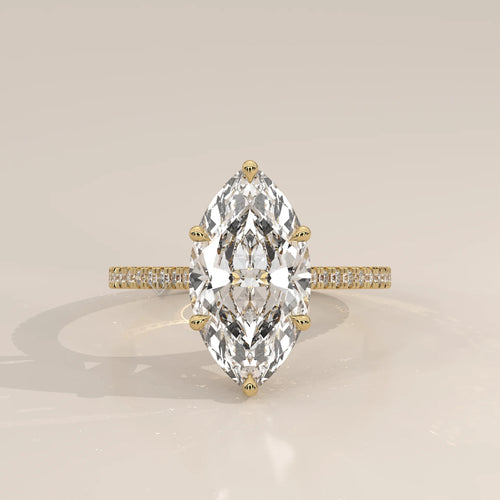Kalesya 5 Carat Marquise Lab Grown Diamond Ring, Hidden Halo Pave in yellow gold, photographed head-on.