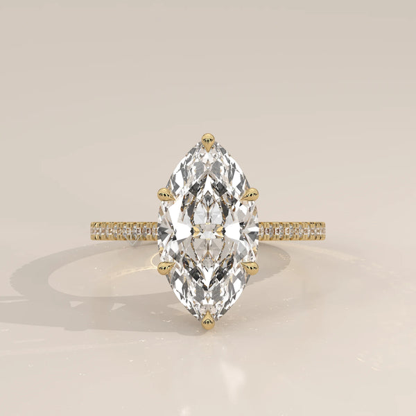 Kalesya 5 Carat Marquise Lab Grown Diamond Ring, Hidden Halo Pave in yellow gold, photographed head-on.