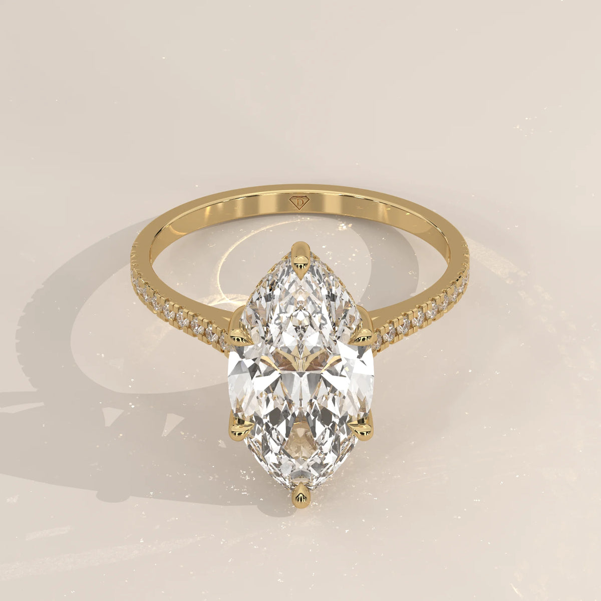 Kalesya 5 Carat Marquise Lab Grown Diamond Ring, Hidden Halo Pave in yellow gold, shown from the front.