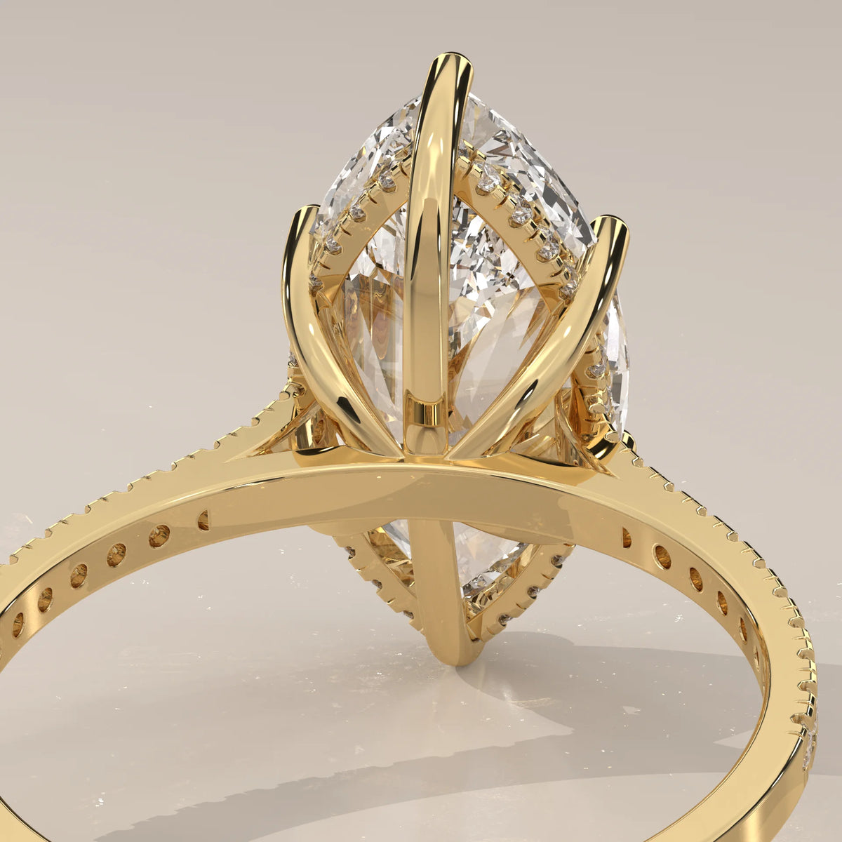 Kalesya 5 Carat Marquise Lab Grown Diamond Ring, Hidden Halo Pave in yellow gold, photographed from the side.