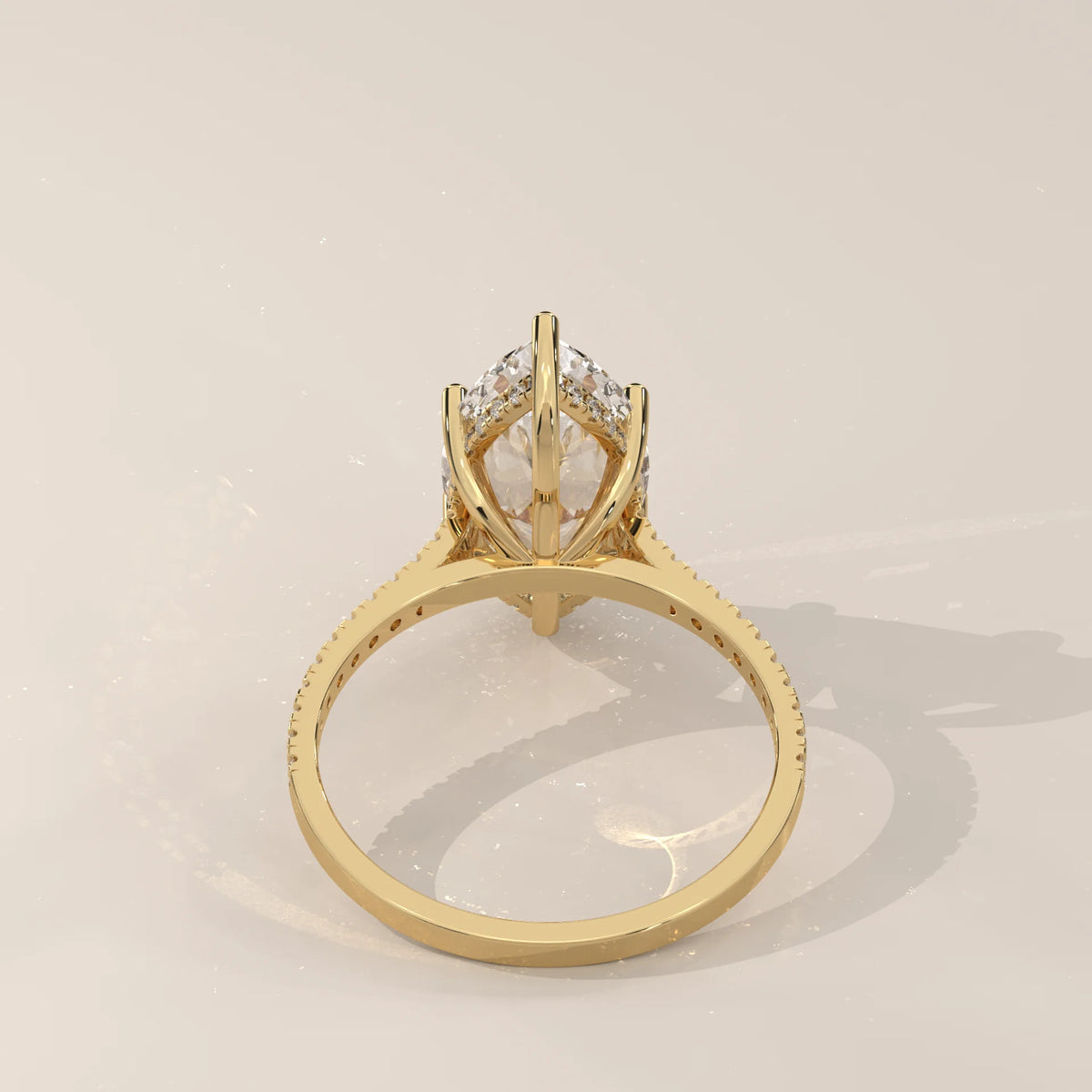 Kalesya 5 Carat Marquise Lab Grown Diamond Ring, Hidden Halo Pave in yellow gold, shown from the side.