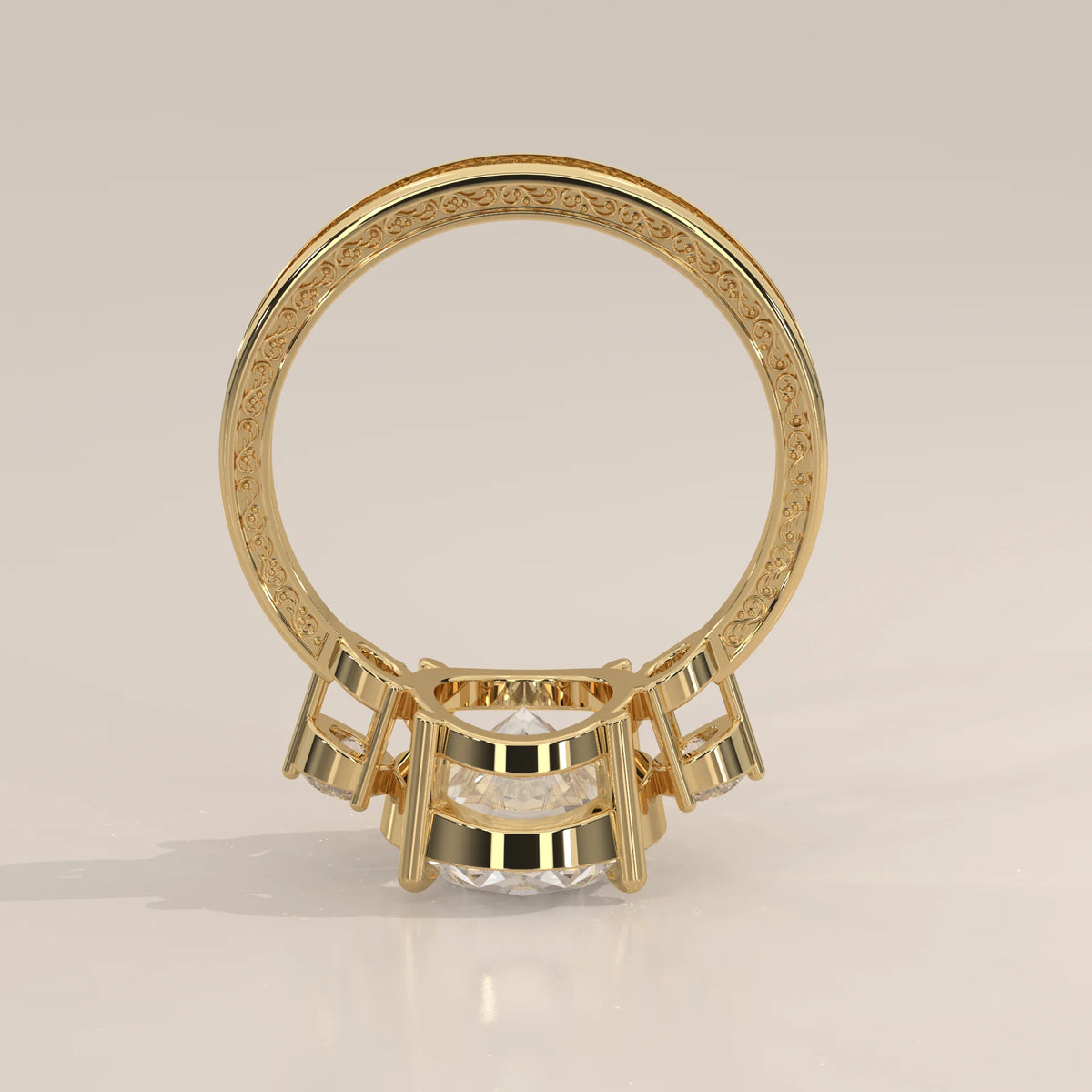 Karly 5 Carat Oval Lab Grown Diamond Three Stone Ring, Engraved Band in yellow gold, photographed from the side.