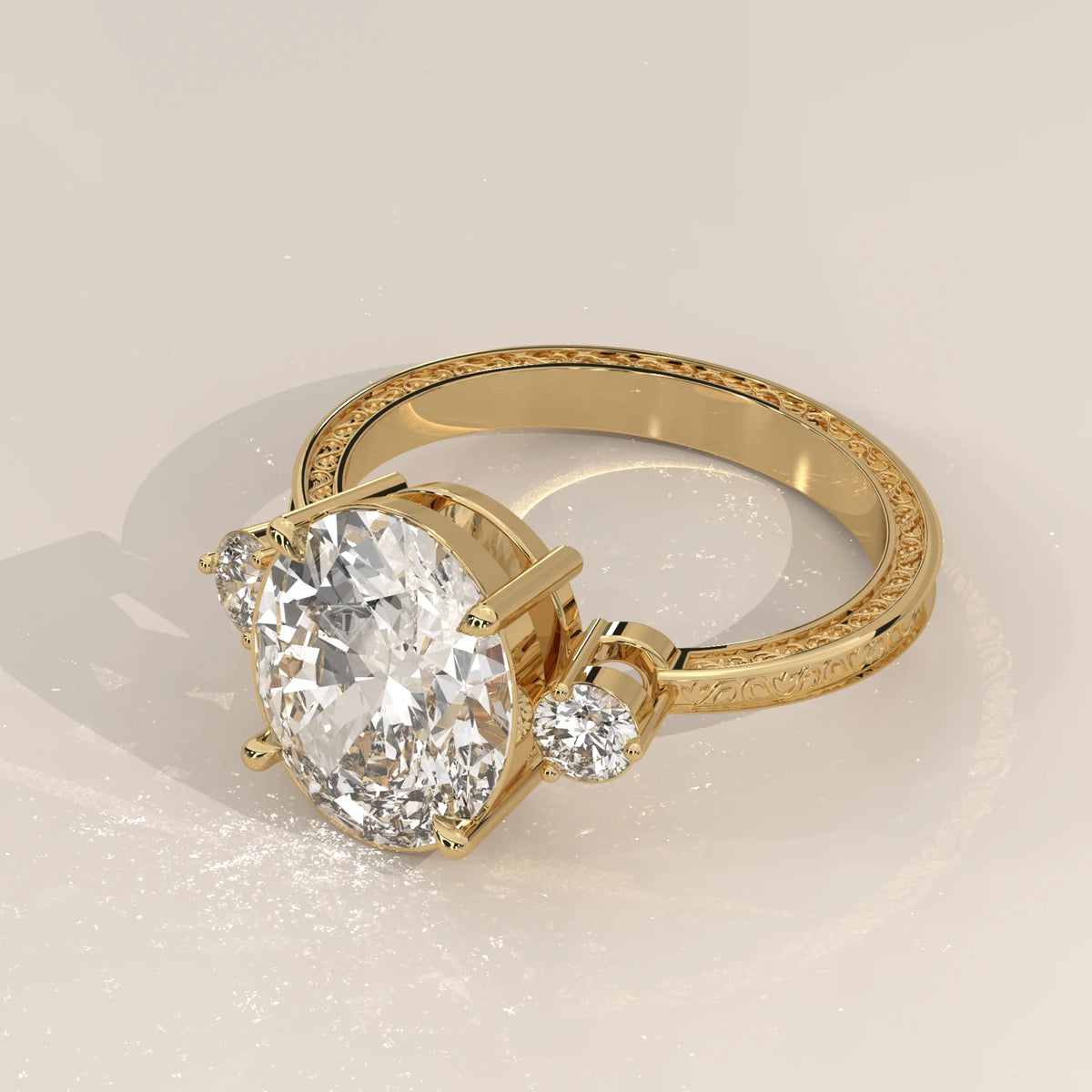 Karly 5 Carat Oval Lab Grown Diamond Three Stone Ring, Engraved Band in yellow gold, shown from the side.