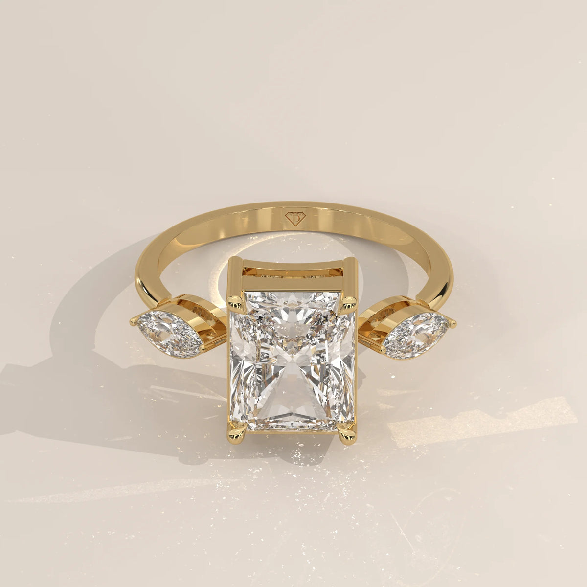 Krace 5 Carat Radiant Lab Grown Diamond Ring, Marquise Three Stone in yellow gold, shown from the front.