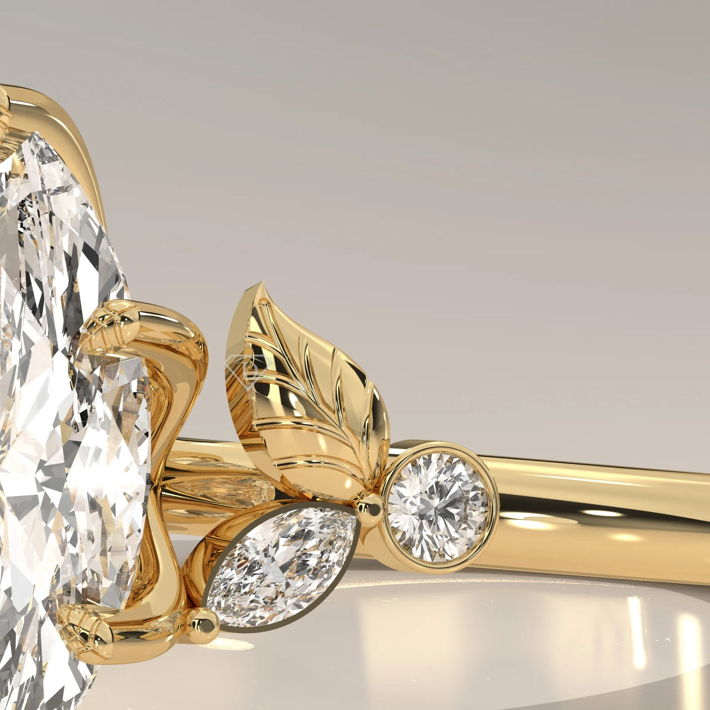Yellow gold ring with leaf accents and a Marquise-cut diamond.